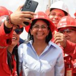 Venezuelan Acting President Delcy Rodríguez poses for a picture with workers during a visit to oil facilities in Monagas state on Thursday, February 12, 2026. Photo: X/@Laiguanatv.