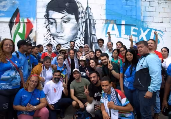 Venezuelan communards from El Panal Commune in Caracas with Palestinian leader Laila Khaled in July, 2025. Photo: Voces en Lucha/file photo.