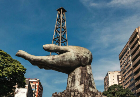 A statue of a hand holding a drilling rig near PDVSA in Caracas, Oct. 9, 2025. Photo: Adriana Loureiro Fernández/The New York Times.