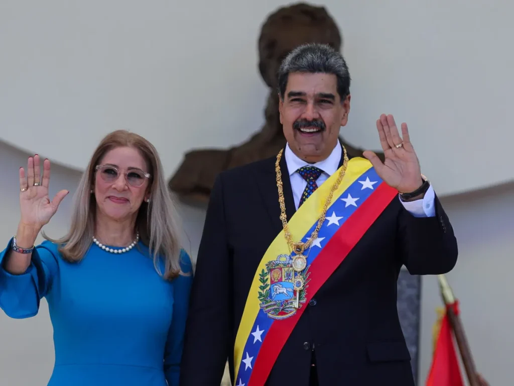 Venezuelan President Nicolas Maduro and his wife Cilia Flores wave after his swearing-in ceremony for a third term in Caracas, Venezuela, Friday, Jan. 10, 2025. Photo: Ariana Cubillos/Associated Press.