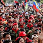 Venezuelan Chavista leader Diosdado Cabello marching Wednesday, February 4, among the people in Maracay during a demonstration to commemorate the Febtuary 4, 1992 civic-military uprising. Photo: Con el Mazo Dando.