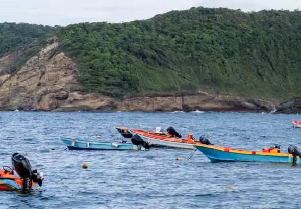 Small boats off the coast of Saint Lucia. Photo: St. Lucia Times/McAllister Hunt.