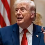 President Donald Trump holds up two Sharpie pens as he speaks during a Cabinet meeting at the White House, March 26, 23036, in Washington. Photo: AP.