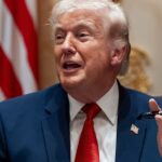 President Donald Trump holds up two Sharpie pens as he speaks during a Cabinet meeting at the White House, March 26, 23036, in Washington. Photo: AP.
