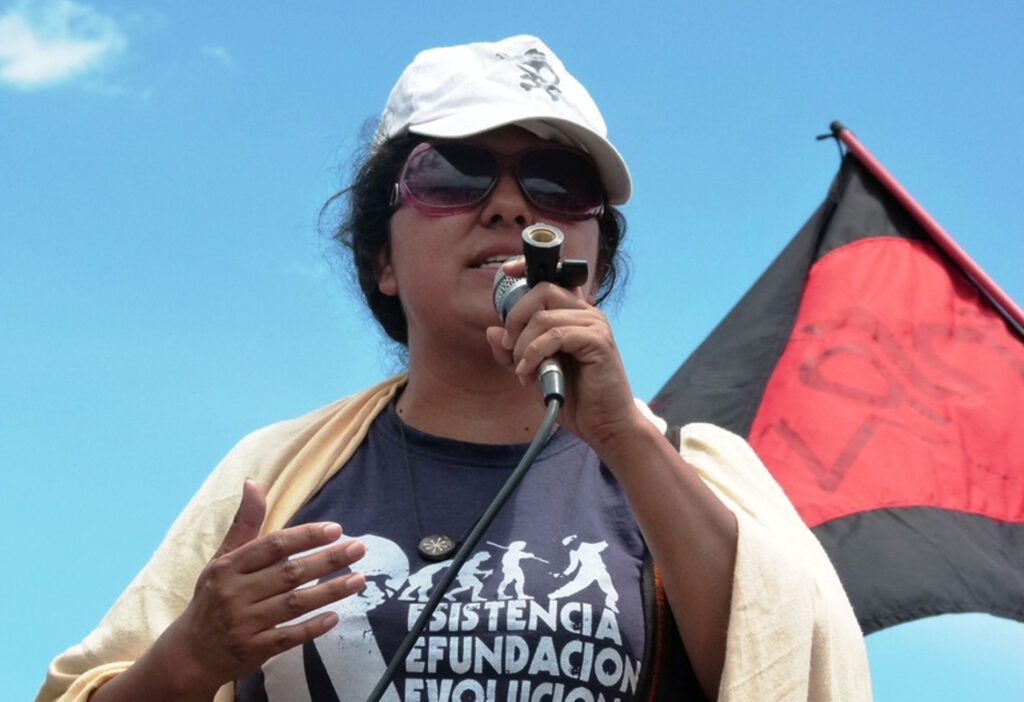 Berta Cáceres speaking outside the Soto Cano US Air Base in Honduras in 2011. Photo: Roger Harris/file photo.