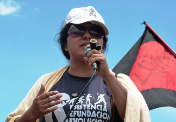 Berta Cáceres speaking outside the Soto Cano US Air Base in Honduras in 2011. Photo: Roger Harris/file photo.