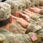 US soldiers giving salute. Photo: Shutterstock.