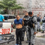 Salvadoran police arrest a man. Photo: National Geographic.