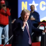 US Regime Dictator Donald Trump dances on stage during a rally at the Rocky Mount Event Center in Rocky Mount, North Carolina on December 19, 2025. Photo: Tasos Katopodis/Getty Images.