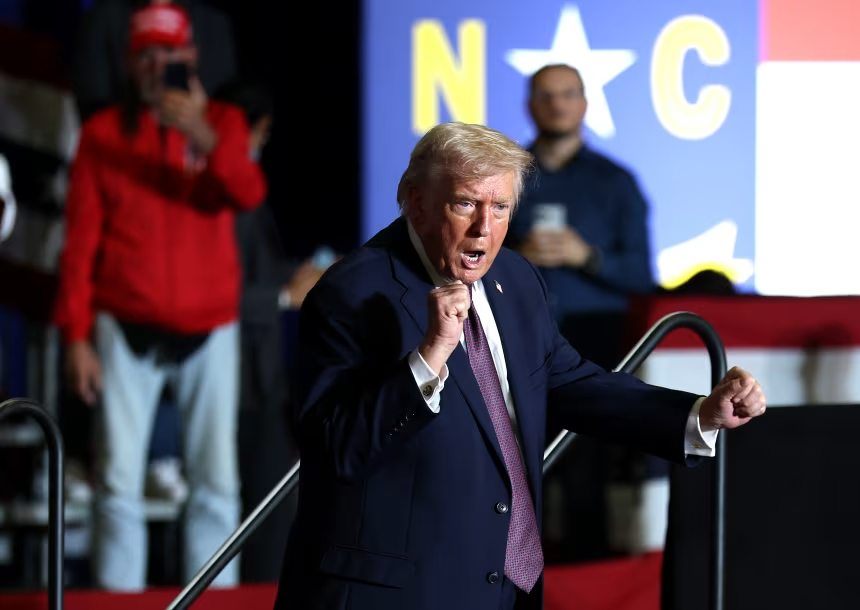US Regime Dictator Donald Trump dances on stage during a rally at the Rocky Mount Event Center in Rocky Mount, North Carolina on December 19, 2025. Photo: Tasos Katopodis/Getty Images.