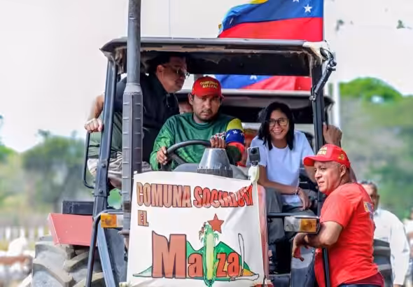 Venezuelan Acting President Delcy Rodríguez rides a tractor during her visit to the renowned El Maizal Commune in Lara state, March 6, 2026. Photo: Venezuelan Presidential Press.