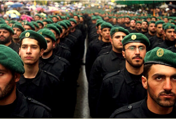 A march involving armed personnel in Lebanon. Photo: MintPress News.