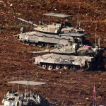 Tanks of the Zionist entity invading Lebanon. Photo: AFP.