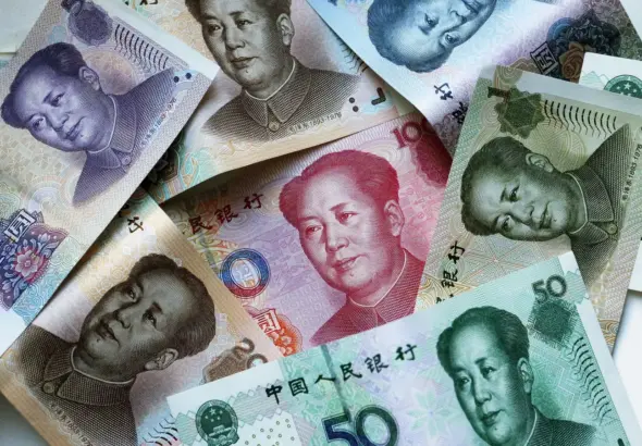 Various denominations of Chinese Renminbi (RMB) banknotes, which are the official currency of the People's Republic of China. Photo: Alexandr Demyanchuk.