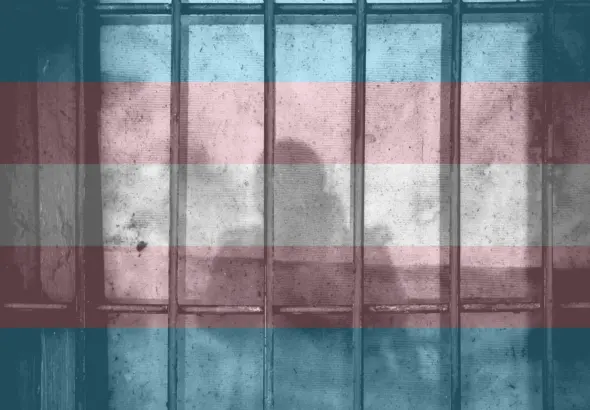 A shadow of a person behind bars in a jail cell. Photo: Ye Jinghan/Unsplash.