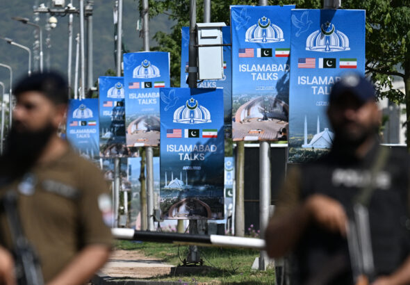 Security personnel stand guard at a security checkpost along a road temporarily closed near the Serena Hotel at the Red Zone area in Islamabad on April 20, 2026, ahead of anticipated US-Iran peace talks. Photo: AFP.
