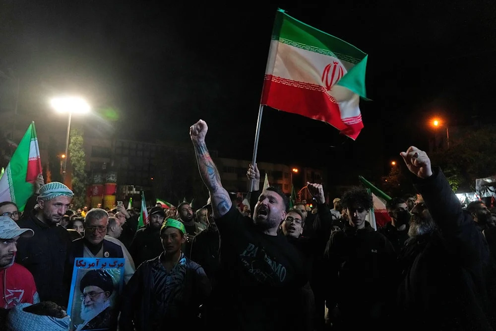 Iranians celebrate the announcement of a two-week ceasefire with the US, at the Inquilab-e-Islami Square in Tehran, in the early hours of April 8, 2026. Photo: AP.