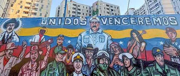 A mural in Venezuela, featuring prominent political figures and the text "UNIDOS VENCEREMOS". Photo: CounterCurrents.