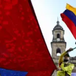 Supporters of Colombian President Gustavo Petro attend a rally he called to protest comments by US President Donald Trump, in Bogota, Colombia, Wednesday, Jan. 7, 2026. Photo: Santiago Saldarriaga/AP.