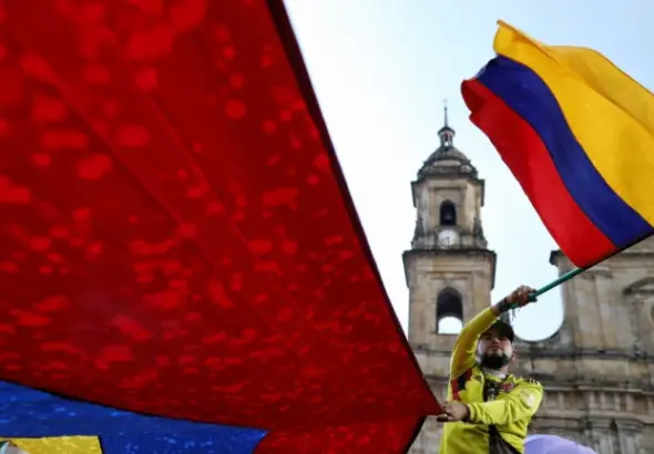 Supporters of Colombian President Gustavo Petro attend a rally he called to protest comments by US President Donald Trump, in Bogota, Colombia, Wednesday, Jan. 7, 2026. Photo: Santiago Saldarriaga/AP.