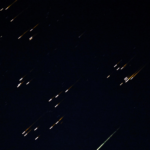 Bright fragments streak across the sky in what local media described as a missile with a split warhead, amid the U.S.-Israeli war on Iran Iran, as seen from Asqalan in occupied Palestine, March 5, 2026. Photo: Reuters.