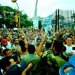 Venezuelans surrounding Miraflores Palace in Caracas during the April 2002 failed coup against President Hugo Chávez, demanding his return. File photo.