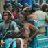 People travel on an electric tricycle in Havana, Cuba. Photo: Morning Star.