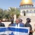 National Security Minister Itamar Ben-Gvir raises the Israeli zionist entity flag on the Temple Mount in Jerusalem’s Old City, May 14, 2026. Photo: Avraham Yitzhak Grossman.