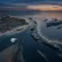 A graphic illustration representing a geopolitical situation regarding a naval blockade in the Strait of Hormuz. Photo: Zeinab al-Hajj/Al Mayadeen English.