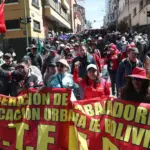 Bolivian trade unionists and peasants march in La Paz, demanding the resignation of President Rodrigo Paz. Photo: EFE.