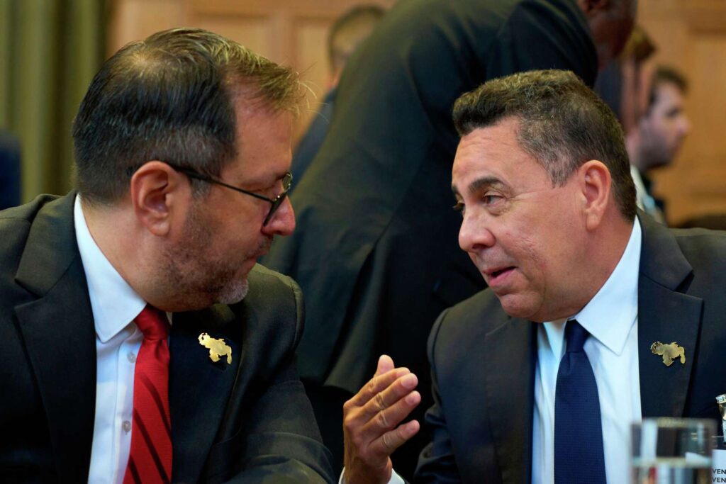 Venezuelan Foreign Minister Yván Gil chats with Ambassador Samuel Moncada during the special session at the International Court of Justice at The Hague, Netherlands, on Monday, May 4, 2026. Photo: Peter Dejong/AP.
