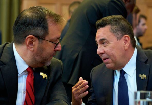 Venezuelan Foreign Minister Yván Gil chats with Ambassador Samuel Moncada during the special session at the International Court of Justice at The Hague, Netherlands, on Monday, May 4, 2026. Photo: Peter Dejong/AP.
