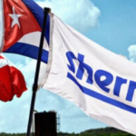 The photo composition shows three flags waving: Canada, Cuba, and Sherritt International. Photo: The Canadian Network on Cuba.