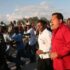 President Hugo Chavez surrounded by Haitinas during a visit to the island in March 2007. Photo: Getty Images/file photo.