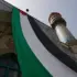 A huge Palestinian flag hangs on a mosque during an anti-¨Israel¨ protests at the Felestin (Palestine) Sq-in Tehran, Iran, April 9, 2025. Photo: AP.