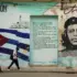 Two students by a housefront with a Che Guevara mural, Havana, Cuba, January 26, 2026. Photo: Jiang Biao/Xinhua News.