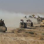 Iraqi forces backed by the Hashed Al-Shaabi (Popular Mobilization units) advance towards the town of Tal Afar, west of Mosul, August 22, 2017. Photo: Ahmad Al-Rubaye/AFP/file photo.
