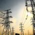 High-voltage electricity transmission towers, or pylons, during a sunset. Photo: File photo.