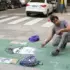 Street artist sketches Diego Maradona in La Boca, Buenos Aires. Photo: Camila Escalante (2025).