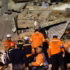Members of emergency bodies search for survivors amid the rubble on June 24, 2026, after twin earthquakes struck Venezuela. Photo: EFE/Ronald Peña R.