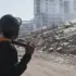 Rescuer looking at a collapsed building in the ground zero of last week's double earthquake that hit northern central Venezuela last week. Photo: Nova News.