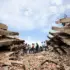 Rescuers work amid collapsed buildings and rubble in La Guaira, Venezuela. Photo: Jesús Vargas/Getty Images.