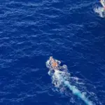 A screenshot from a video obtained by the Global Times on July 21, 2026 shows the transfer of injured Philippine personnel near Ren'ai Jiao, which was overseen and assisted by the China Coast Guard. Photo: Courtesy of the China Coast Guard.
