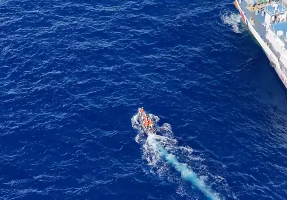 A screenshot from a video obtained by the Global Times on July 21, 2026 shows the transfer of injured Philippine personnel near Ren'ai Jiao, which was overseen and assisted by the China Coast Guard. Photo: Courtesy of the China Coast Guard.