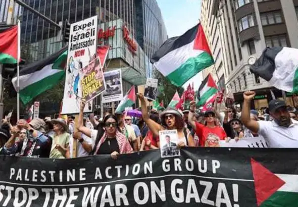 Protesters led by the Palestine Action Group march through Sydney’s central business district, Australia, on February 22, 2026. Photo: PressTV.