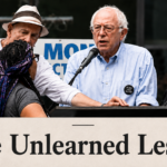 Activists Marissa Janae Johnson, left, and Mara Jacqeline Willaford interrupt Sanders in Seattle. Photo: Brandon Wall/Twitter.