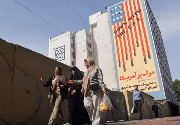 Anti-U.S. mural on a building in Tehran, Iran, says ‘Down with the USA’. Photo: Majid Asgaripour/Reuters.