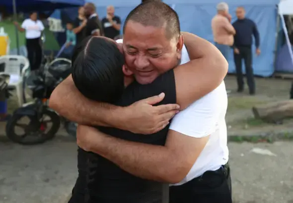 Arturo Sairias embraces a family member after being released from the Rodeo 1 prison in Guatire, Venezuela, June 14, 2026. Photo: Ronald Peña R/EFE.