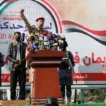 Yemeni Armed Forces spokesperson Yahya Saree speaks during a rally in Sanaa, Yemen, Friday, Sept. 27, 2024. Photo: Osamah Abdulrahman/AP.