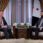 A photo of the meeting between UK National Security Advisor Jonathan Powell and Syrian leader Ahmad al-Sharaa, with Foreign Minister Asaad Al Shaibani also present, as described in the article. Photo: Vanessa Beeley/file photo.